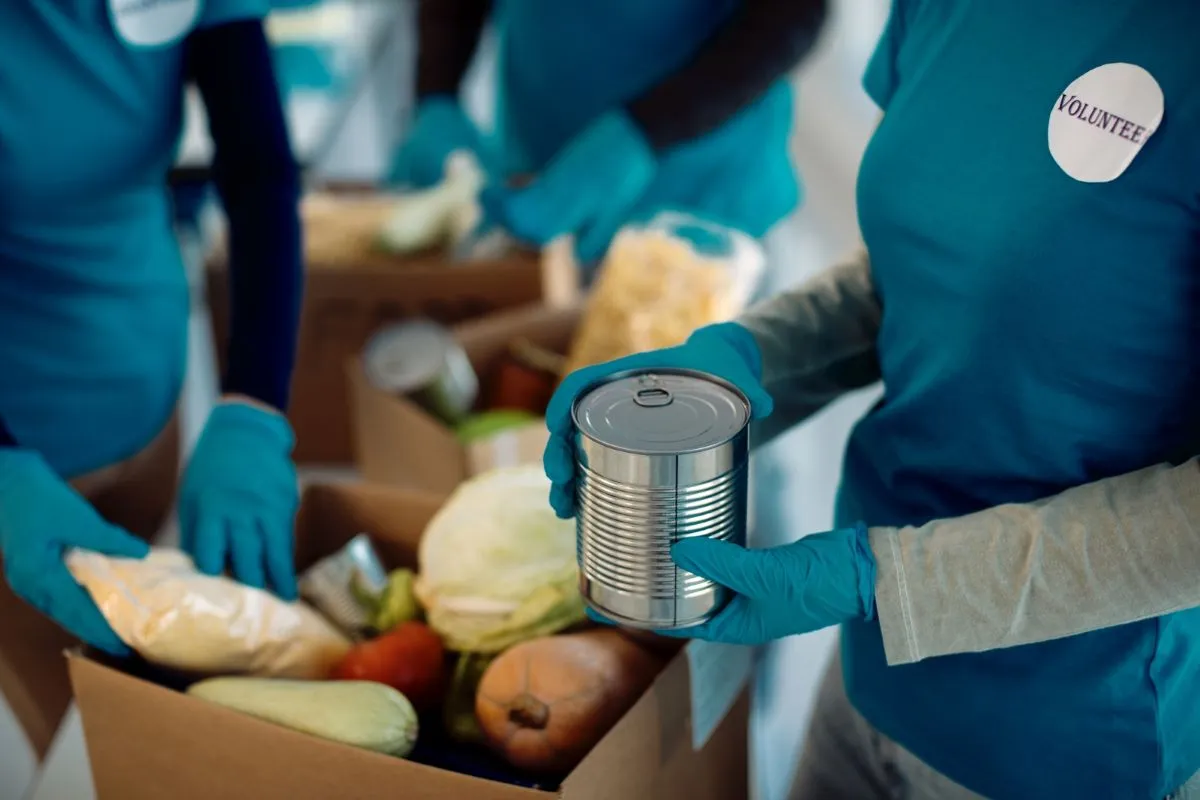 Volunteers helping pack food at a nonprofit.